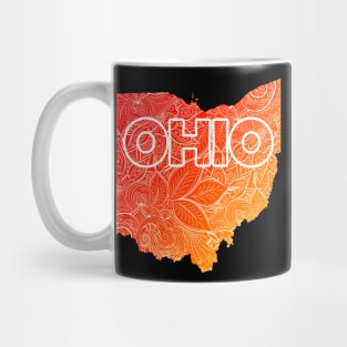 Colorful mandala art map of Ohio with text in red and orange Mug